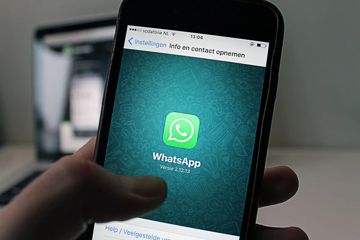 From WhatsApp message to department assignment Smartphone showing a WhatsApp chat